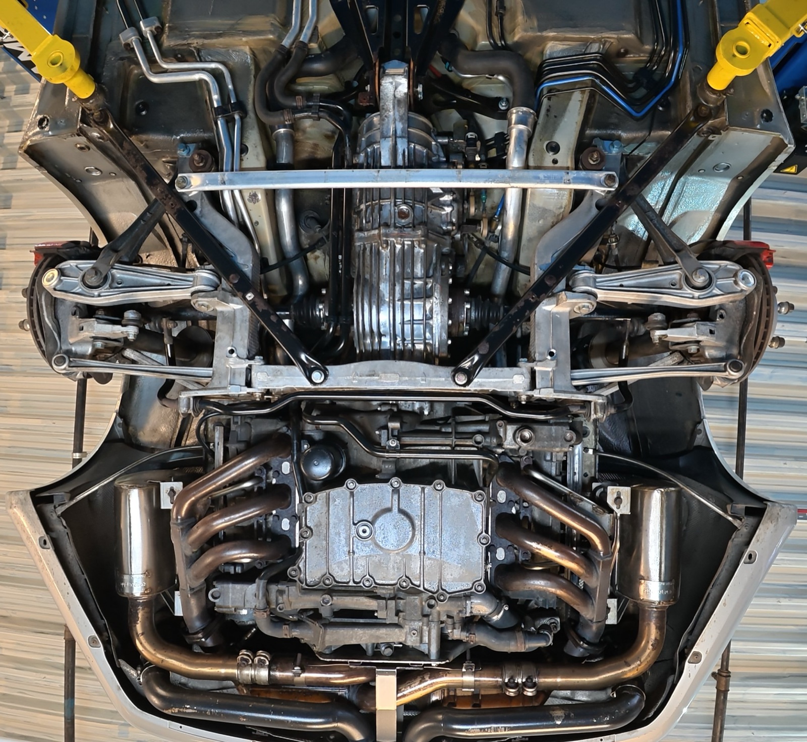 Porsche 911 underbody after dry ice cleaning and IGL Aegis — clean, treated surface